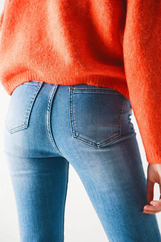 Jeans évasés taille haute des années 70 en denim extensible délavé clair - Pantalons