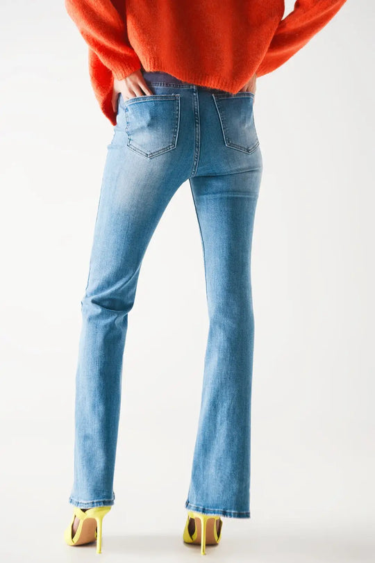Jeans évasés taille haute des années 70 en denim extensible délavé clair - Pantalons