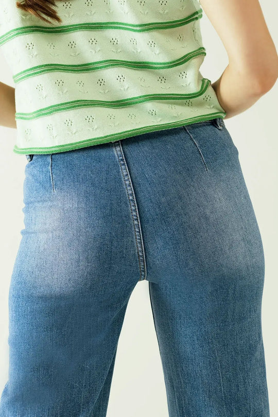 Jeans jambes larges avec fermeture frontale par boutons métalliques et poches frontales - Pantalons
