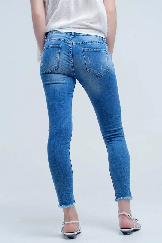Jeans skinny à lavage moyen avec déchirures - Pantalons