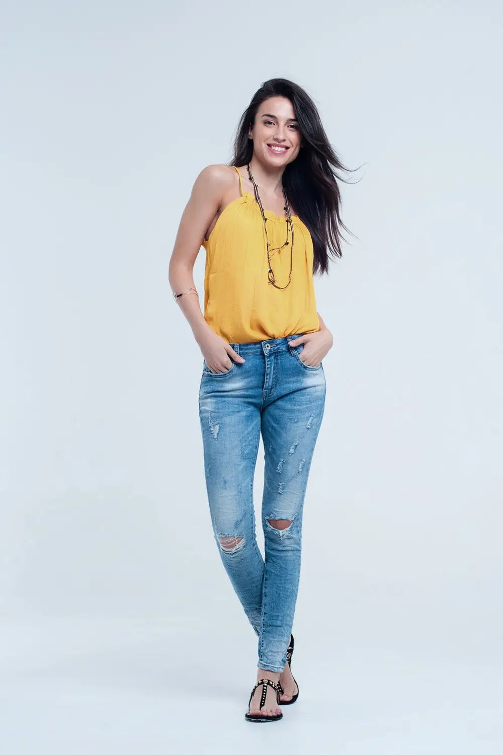 Jeans skinny à mi-lavage avec déchirures au genou - Pantalons