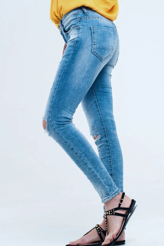 Jeans skinny à mi-lavage avec déchirures au genou - Pantalons