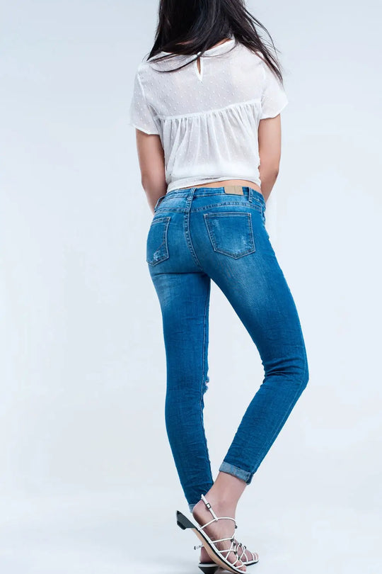 Jeans skinny élastiques avec déchirures - Pantalons