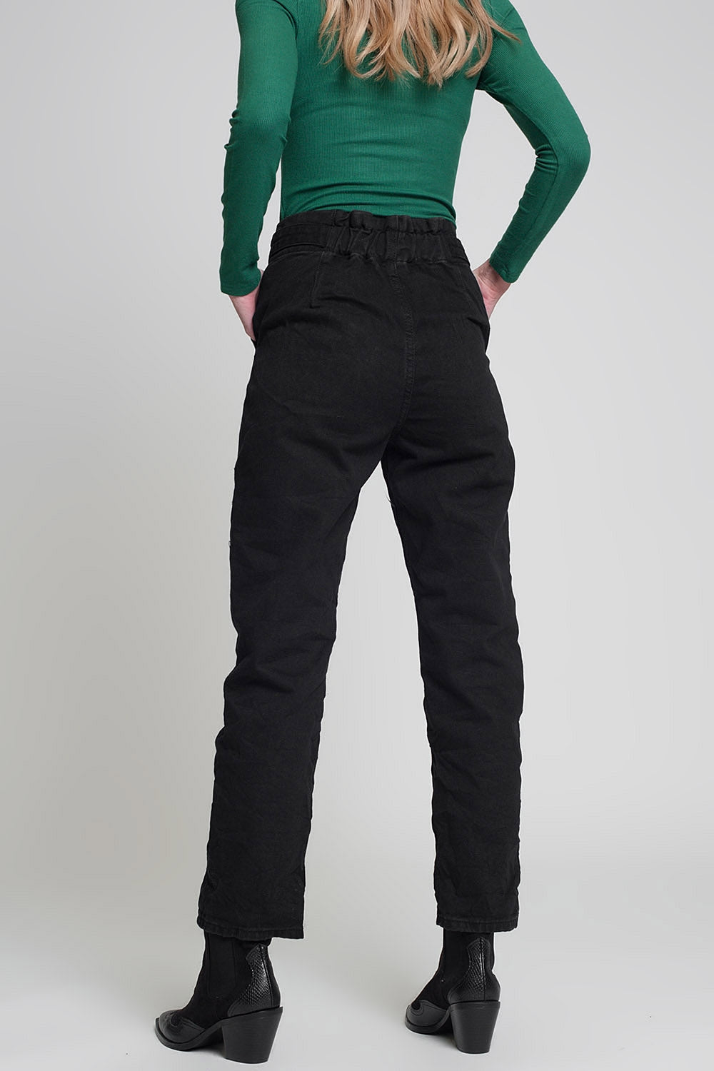 Jeans with paper bag waist and button details in black