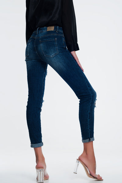 Jeans with sequins and rips