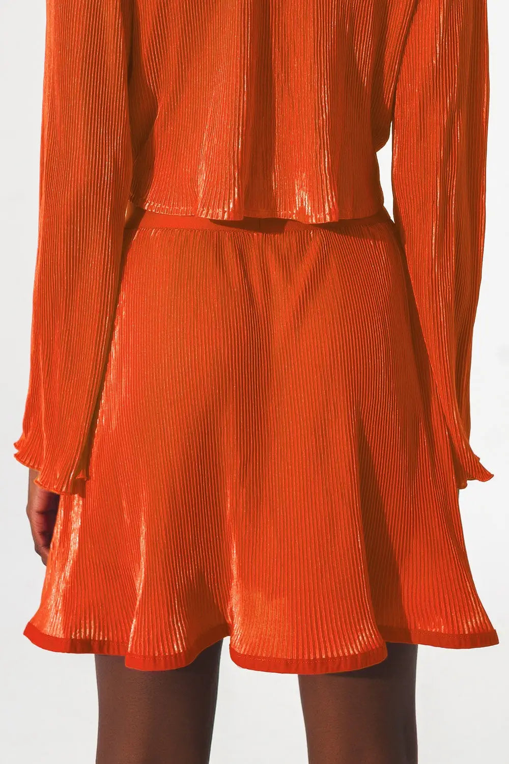 Jupe courte plissée en orange - Jupes
