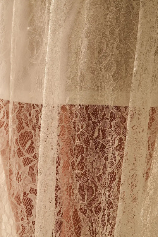 Jupe maxi en dentelle blanche avec détails en paillettes - Jupes