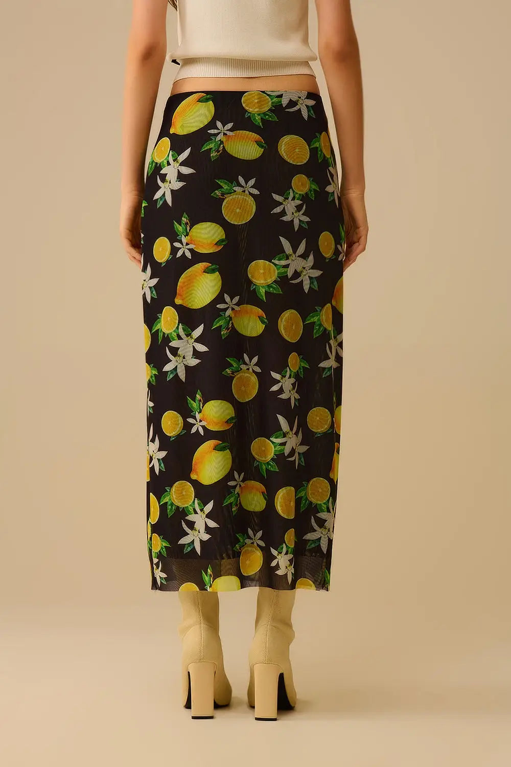 Jupe midi ajustée en maille noire avec imprimé citron - Jupes