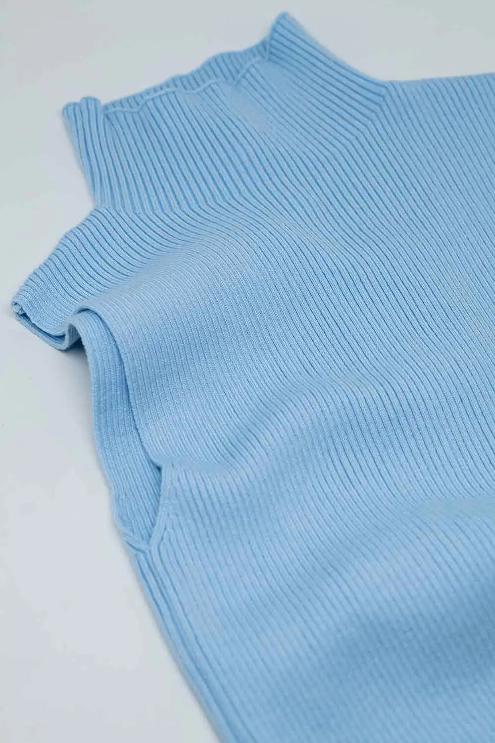 Knitted light blue top without sleeves - Sweaters