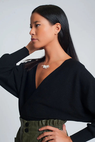 Knitted sweater with wrapped V-neck in black - Sweaters