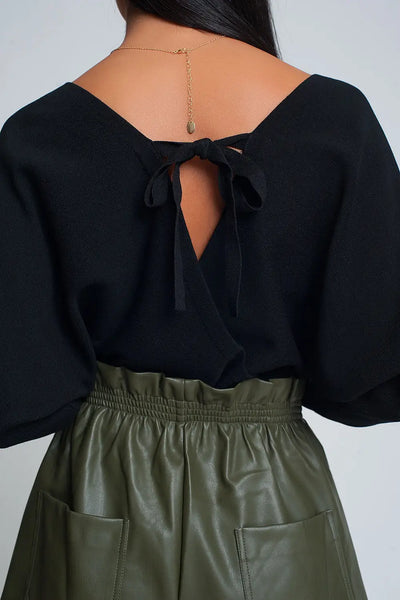 Knitted sweater with wrapped V-neck in black - Sweaters