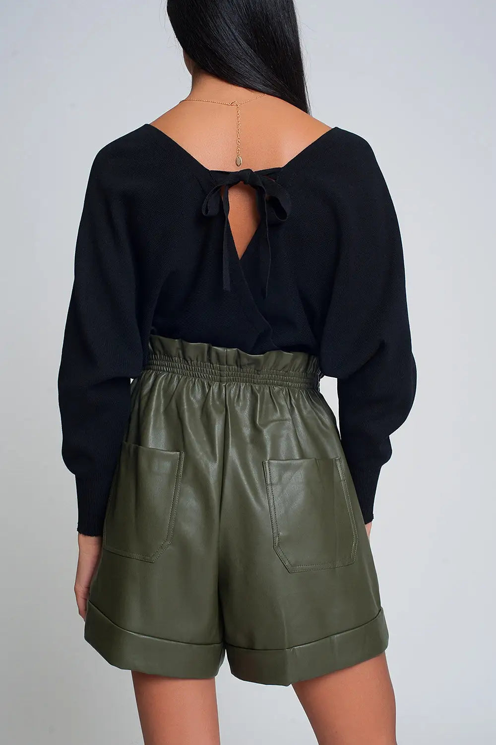 Knitted sweater with wrapped V-neck in black - Sweaters