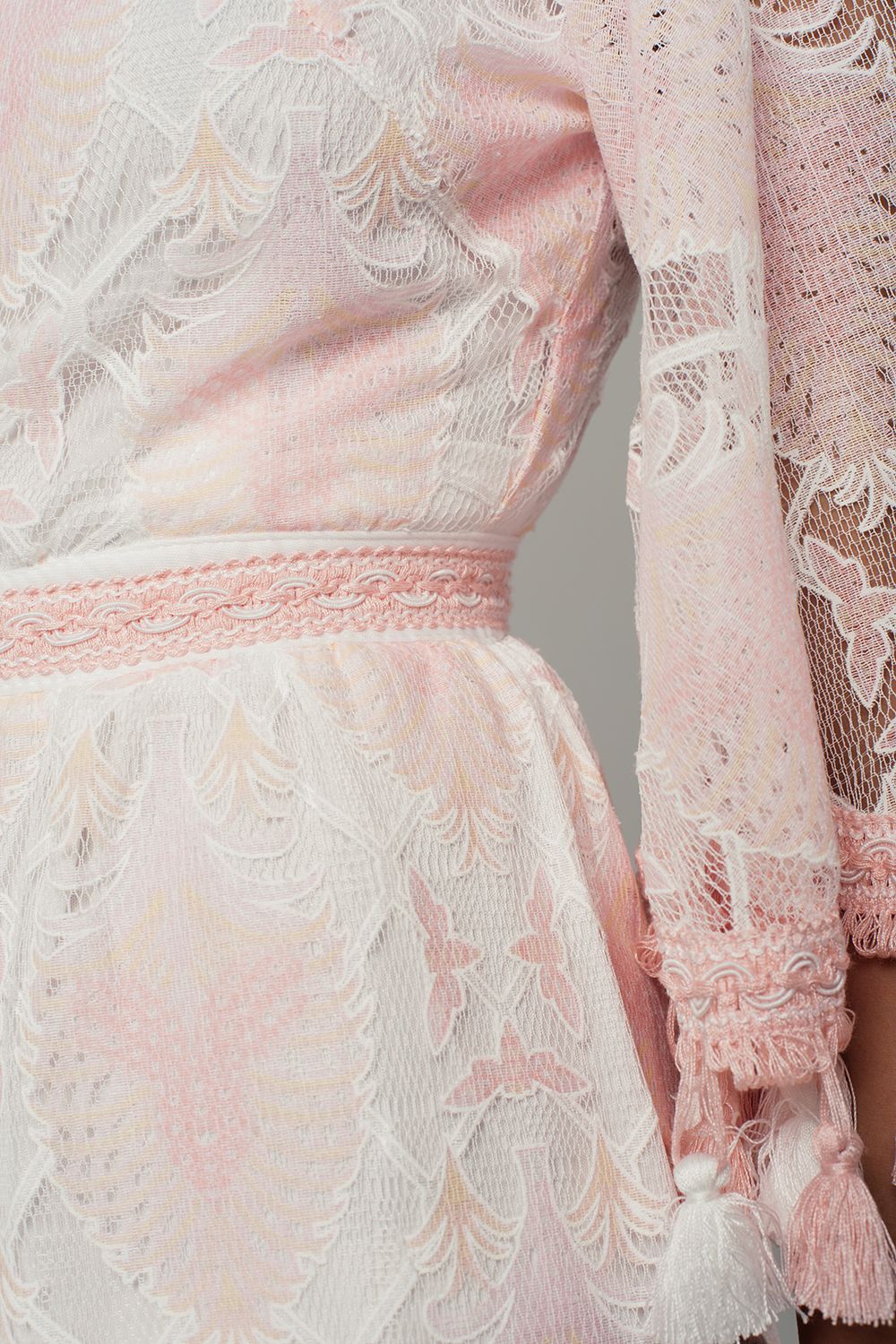 Lace romper with tassels in pink