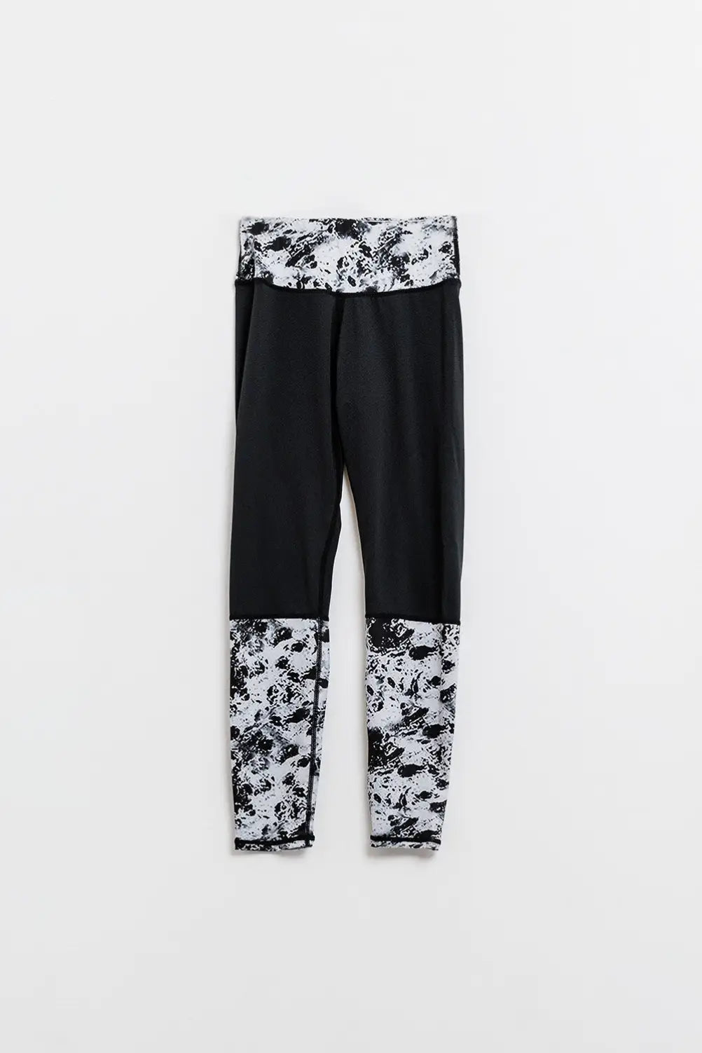 Q2 Leggings noirs avec ceinture et ourlets imprimés marbrés