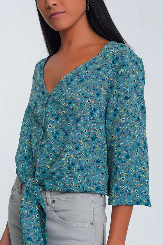 Long sleeve v neck blouse with button detail in green floral print - Shirts