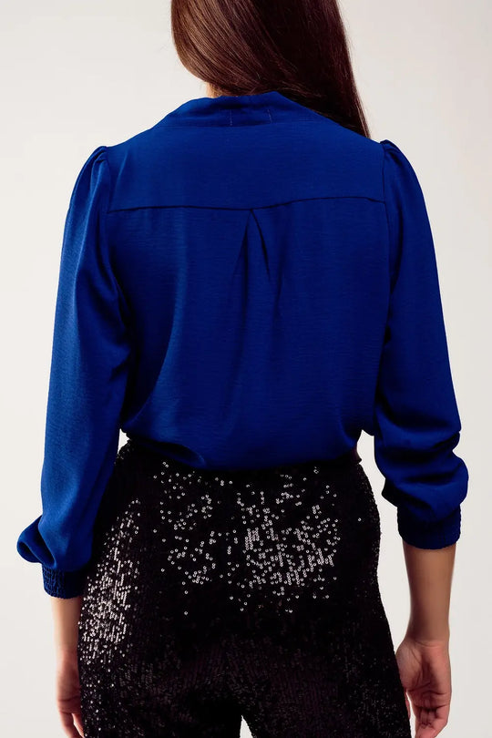 Long sleeved wrap satin blouse in blue - Shirts