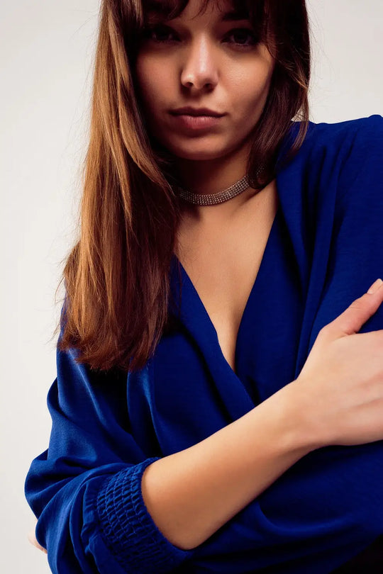 Long sleeved wrap satin blouse in blue - Shirts
