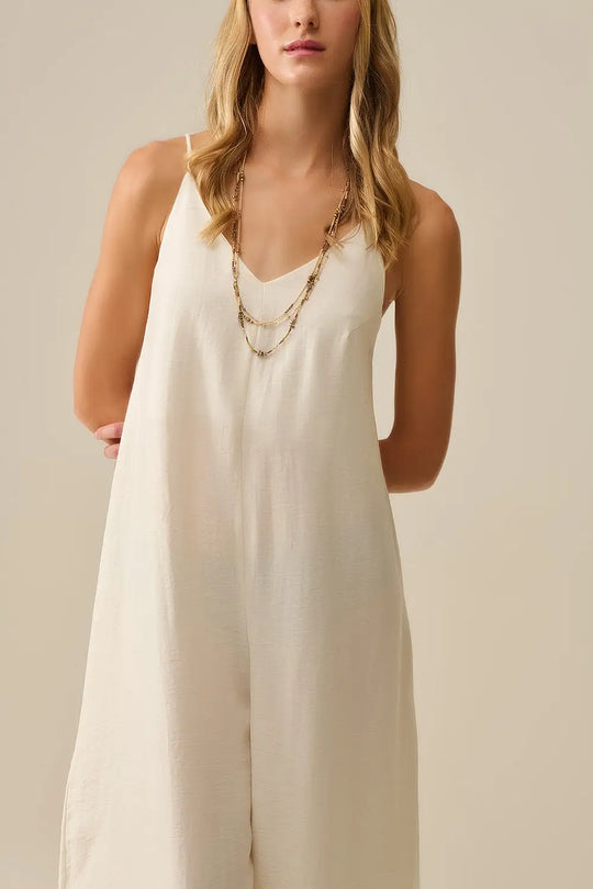 Long Textured Jumpsuit with Beaded Straps in Cream - Dresses