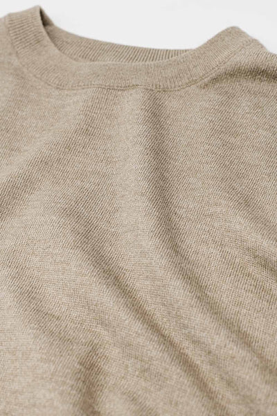 Loose fine-knit sweater in beige with a round neck