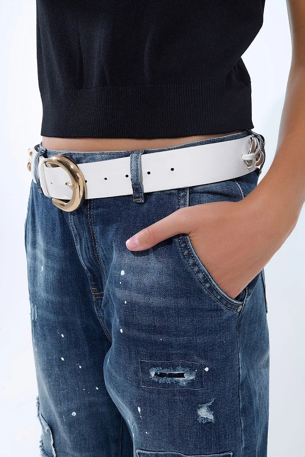 Loose-fitting jeans with distressed patches and paint details - Jeans