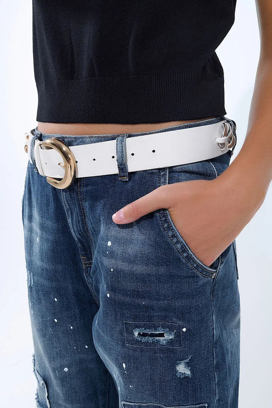 Loose-fitting jeans with distressed patches and paint details - Jeans