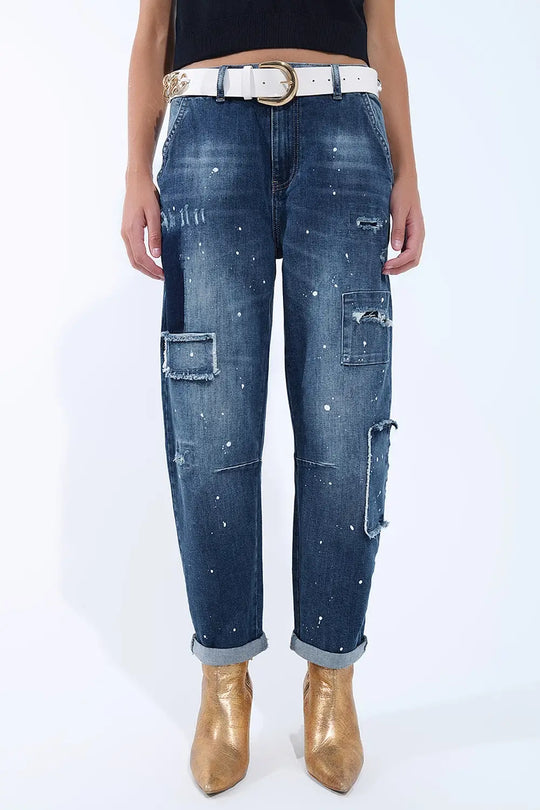Q2 Loose-fitting jeans with distressed patches and paint details