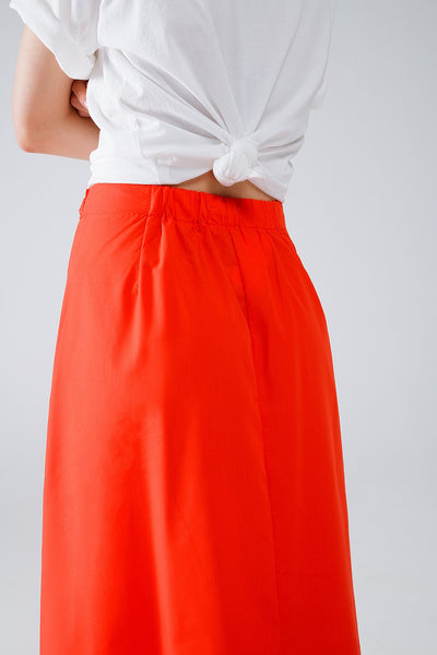 Maxi orange poplin skirt with knot detail at the waist