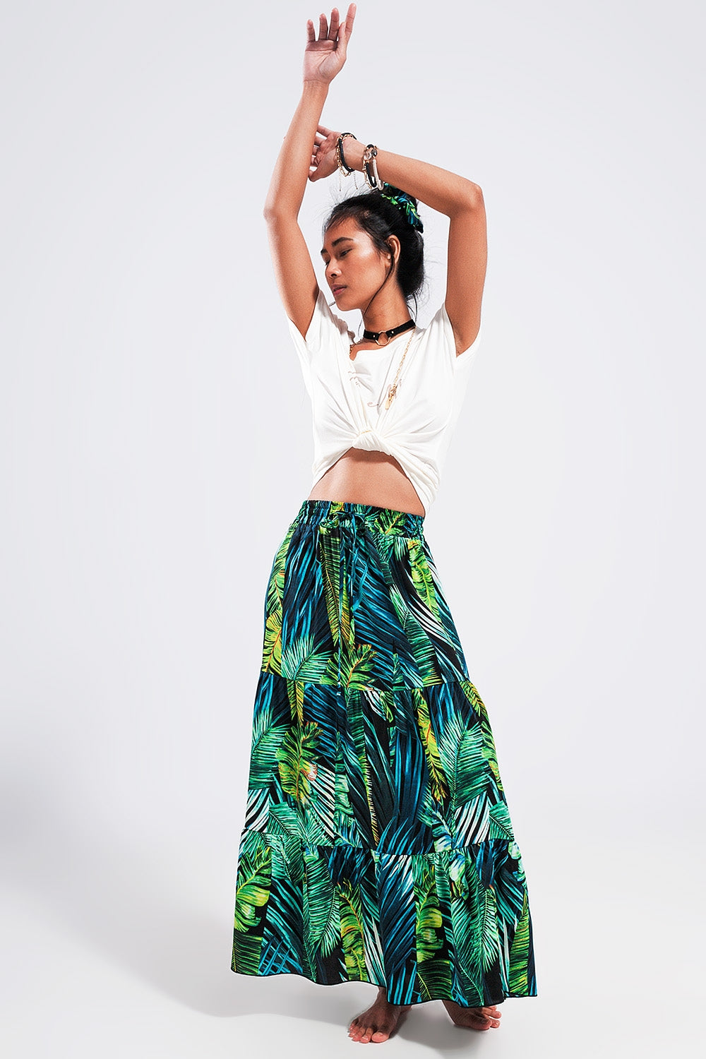 Maxi tiered skirt in green tropical print