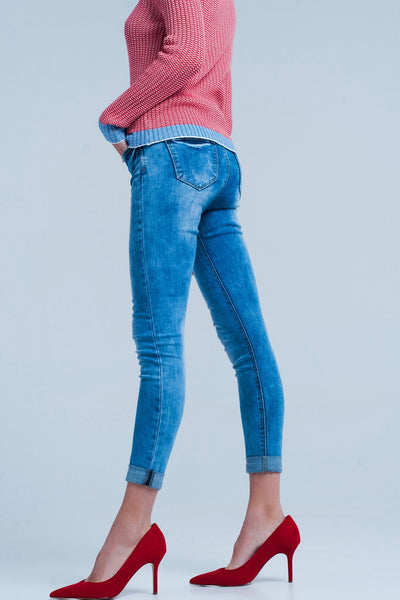 Medium wash skinny jeans with leopard print