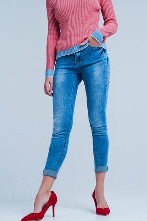 Q2 Medium wash skinny jeans with leopard print