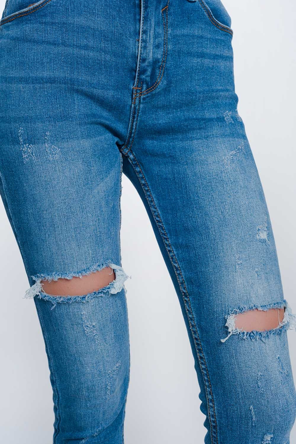 Mid denim super skinny jeans with holes in the knees