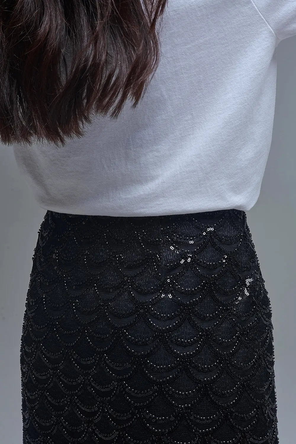 Minijupe à paillettes festonnées noire - Jupes