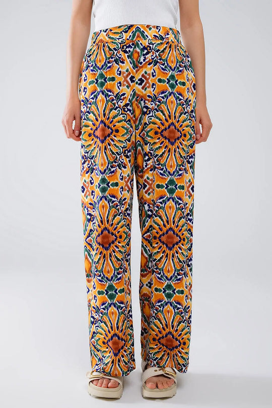 Multicolor Pants With Flower Print In Orange And Blue - Pants