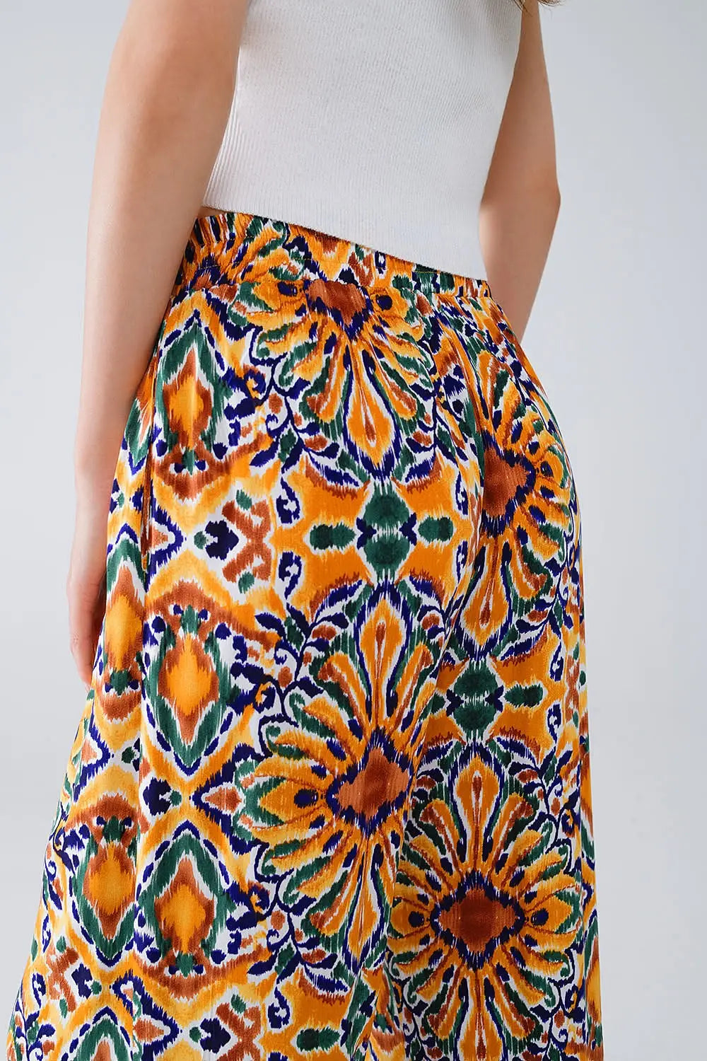 Multicolor Pants With Flower Print In Orange And Blue - Pants
