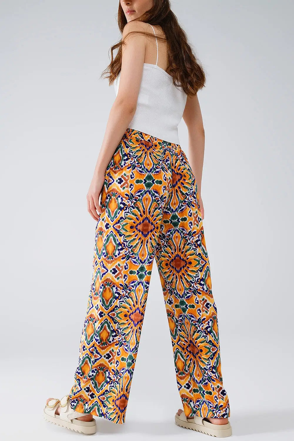 Multicolor Pants With Flower Print In Orange And Blue - Pants