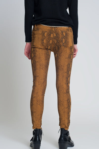 Mustard super skinny reversible pants with snake print