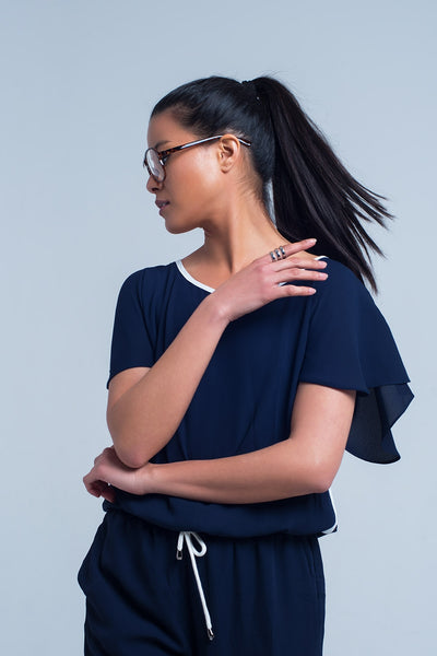 Navy blue jumpsuit with short sleeve and ruffle detail