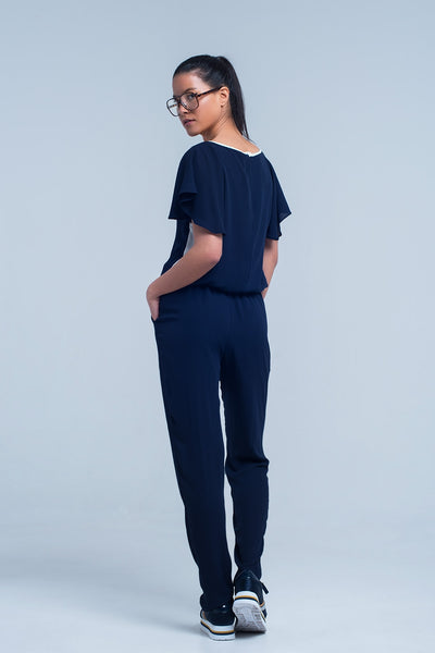 Navy blue jumpsuit with short sleeve and ruffle detail