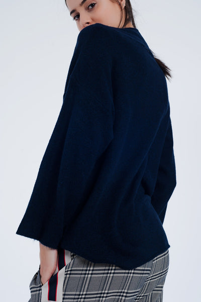 Navy blue sweater with wide sleeves