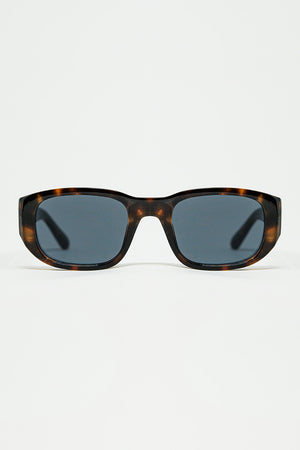 Q2 Oval Sunglasses with High Gloss Transparent Frames in brown