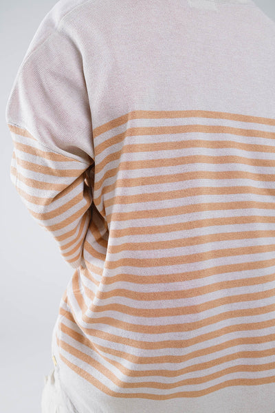 Oversized beige sweater with brown stripes and V-neck