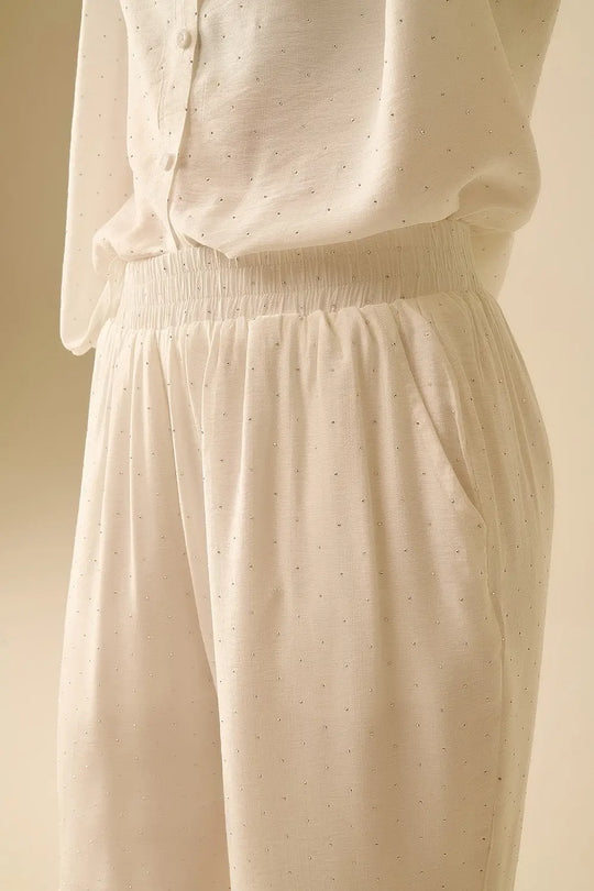 Pantalon blanc léger à jambes larges avec détails en strass - Pantalons