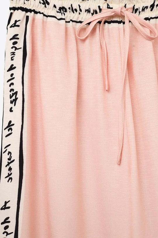 Pantalon d’été rose imprimé aquarelle - Pantalons