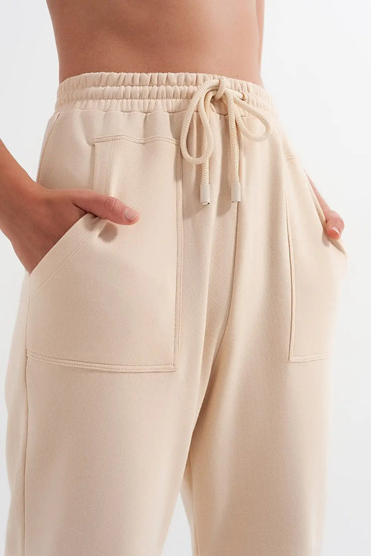 Pantalon de jogging avec bande élastique à la taille beige - Pantalons