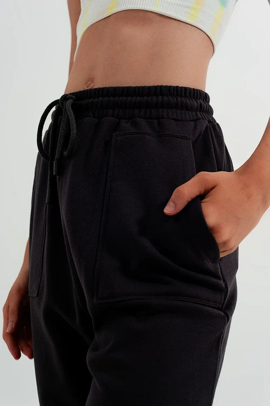 Pantalon de jogging avec bande élastique à la taille gris foncé - Pantalons