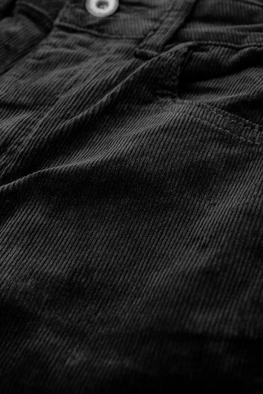 Pantalon évasé en velours côtelé noir avec imprimé léopard sur le bas - Pantalons