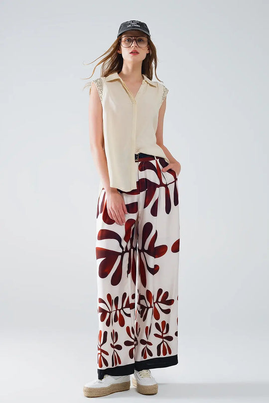 Pantalon large à imprimé abstrait en blanc et marron - Pantalons