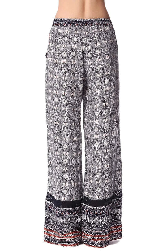 Pantalon large bleu à imprimé ethnique et insert en dentelle frangée - Pantalons
