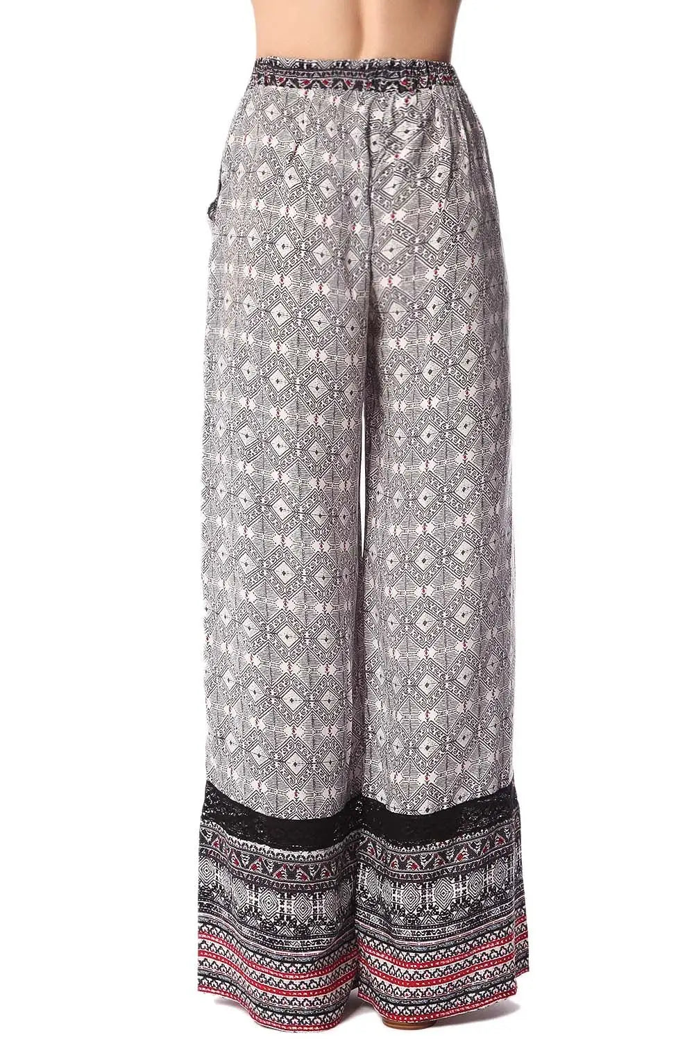 Pantalon large noir à imprimé ethnique et insert en dentelle frangée - Pantalons
