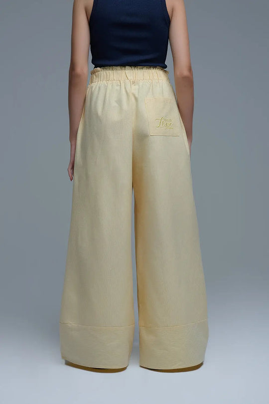 Pantalon palazzo rayé jaune avec jambe extra large - Pantalons